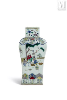 a white vase with a picture of people on it