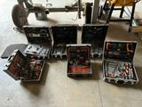 a lot of tools in the case on the floor