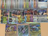 plusieurs types de cartes pokemon sur la table