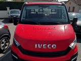 a red van that is parked in a parking lot