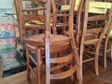 a lot of chairs that are sitting on a table
