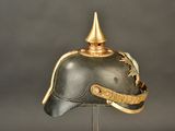 a helmet on a stand on a gray background