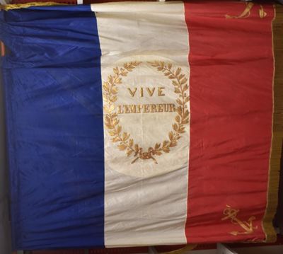 an image of a large french flag hanging on a wall