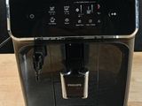 an image of a coffee machine on a wooden table