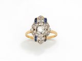 une bague sertie de diamants et de saphirs