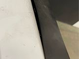 a knife that is laying on a counter top