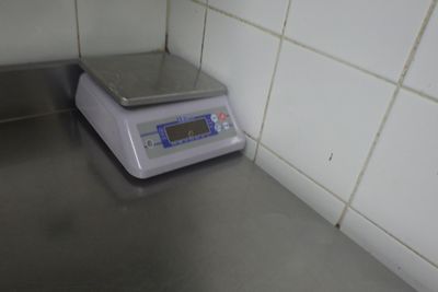 a scale sitting on a counter in a kitchen