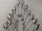 a lot of silver spoons and spoon spoons arranged in a circle