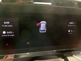 a picture of a car dashboard with a display on it