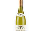 a close up of a bottle of wine on a white background