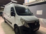 a white van that is parked in a garage