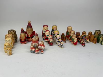 many wooden figurines of different sizes and colors