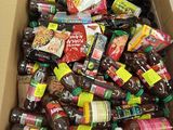 a cardboard box filled with lots of different types of food
