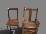 two wooden chairs sitting next to each other on a gray surface