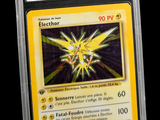 the pokemon card is in a clear plastic holder on a black background