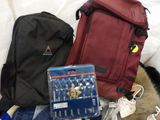 a lot of items that are sitting on a bed