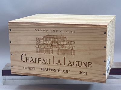 une boîte en bois sur laquelle figure une image du château de Lagonne