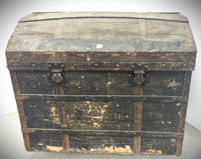 an old wooden chest with a metal latch on it