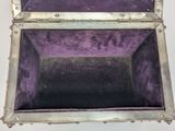 a purple box that has a purple lining inside of it