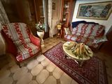 two chairs and a table in a living room