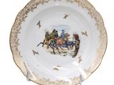 a plate with a picture of a man on a horse drawn carriage