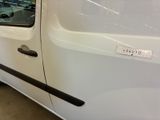 a white van with a sticker on the side of it