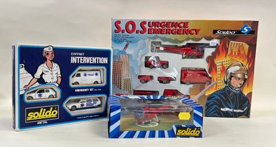 two boxed toys that include a police car, ambulance, and police car