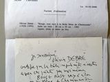 a close up of a piece of paper with writing on it