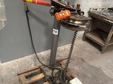 a machine that is sitting on a pallet in a room