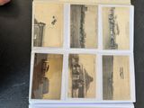 an old photo of a picture of a train on the tracks