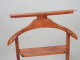 a wooden hanger with a wooden hanger on it