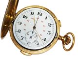 a close up of a pocket watch on a white background