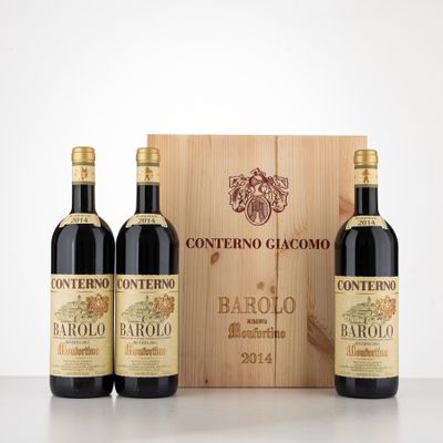 three bottles of wine in front of a wooden box