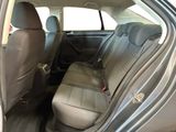 the back seats of a car are empty and the passenger seat is empty