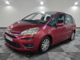 the red citrole is parked on a checkered floor
