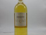 a bottle of wine that is sitting on a table
