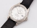 an image of a close up of a wrist watch on a white surface