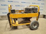 an image of a small portable generator on a cart