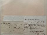 the letter is written on a piece of paper with a stamp on it