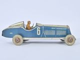 a blue toy car with a dog in the driver ' s seat