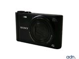 the camera is sitting on a white surface with a white background