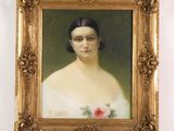 portrait of a woman in a white dress with a rose in her hair