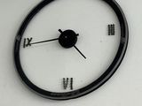 a clock on the wall above a bulletin board