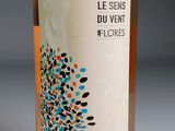 a bottle of wine that is sitting on a table