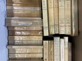 a box full of books sitting on top of a table