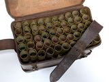 an open suitcase with a bunch of glasses inside of it
