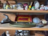 a shelf that has many different items on it