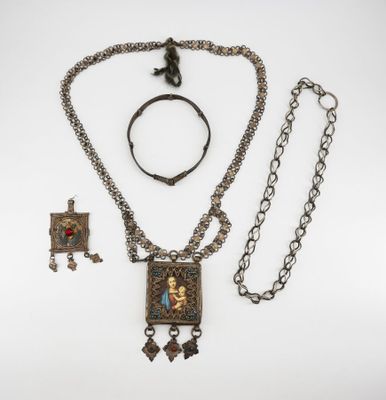 an assortment of jewelry including a necklace, bracelet, and ring