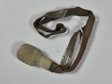 a small piece of cloth and a small piece of wood