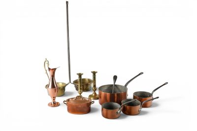 many pots and pans that are sitting on a table